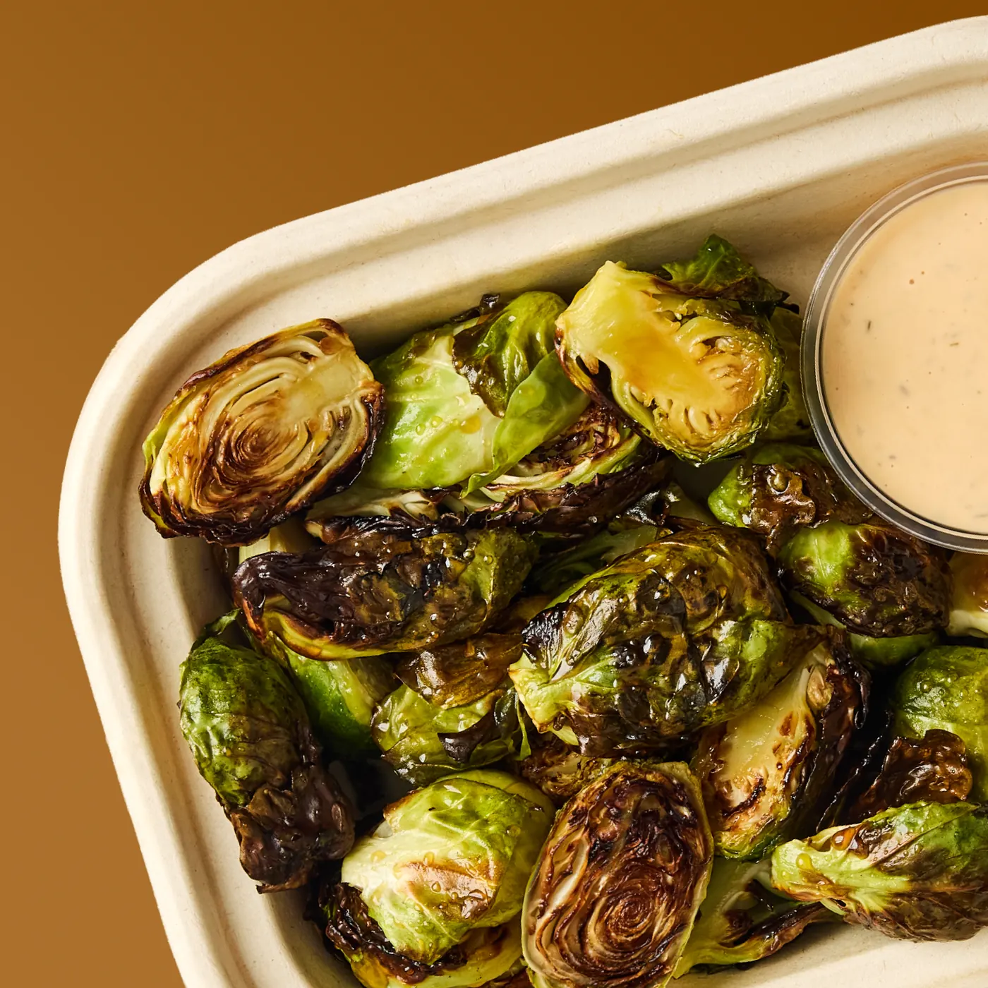 Sweetgreen Roasted Brussels Side of maple-glazed brussels sprouts served with charred jalapeño ranch
