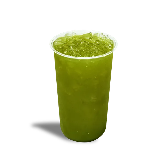 sweetgreen Ginger Greens, a bright green housemade drink of apple, spinach and ginger over ice in a clear cup