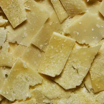 Shards of shaved parmesan cheese